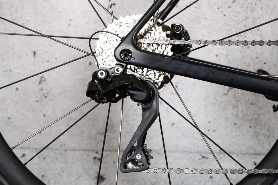 拨链器变速系统调整_山地车换个塔基多少钱_自行车爬坡变速技巧